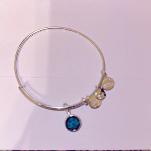 Alex + Ani bracelet with emerald stone